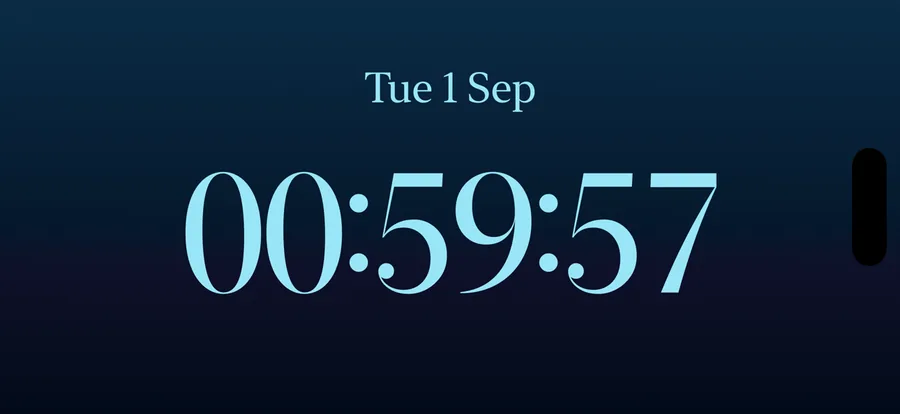 Live Seconds Bedside Mode: a full-screen landscape clock showing the date, hours, minutes and seconds
